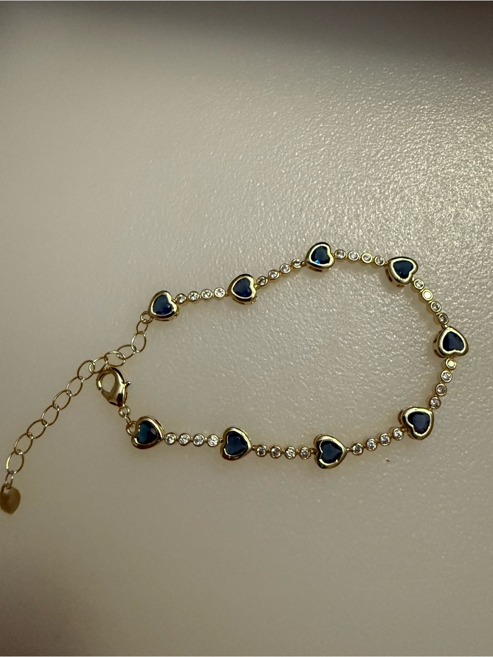 Adina Eden Gold Bracelet with Navy Blue Heart Accents and Clear Stones
